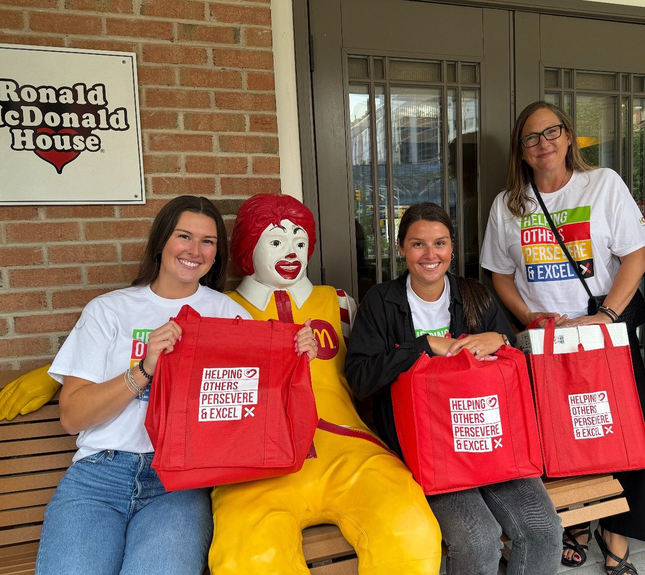 Volunteer smiling during community event